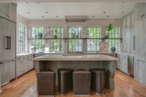 Beautiful marble, glass, natural wood kitchen designed by Jeffrey Dungan. https://kristywicks.com