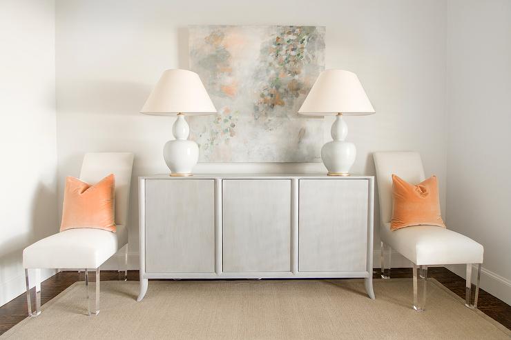 pair of lamps on sideboard in white Dining Room . https://kristywicks.com