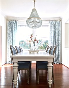 Blue and white dining room with Edisto white beaded chandelierf rom Kathy Kuo Home. https://kristywicks.com