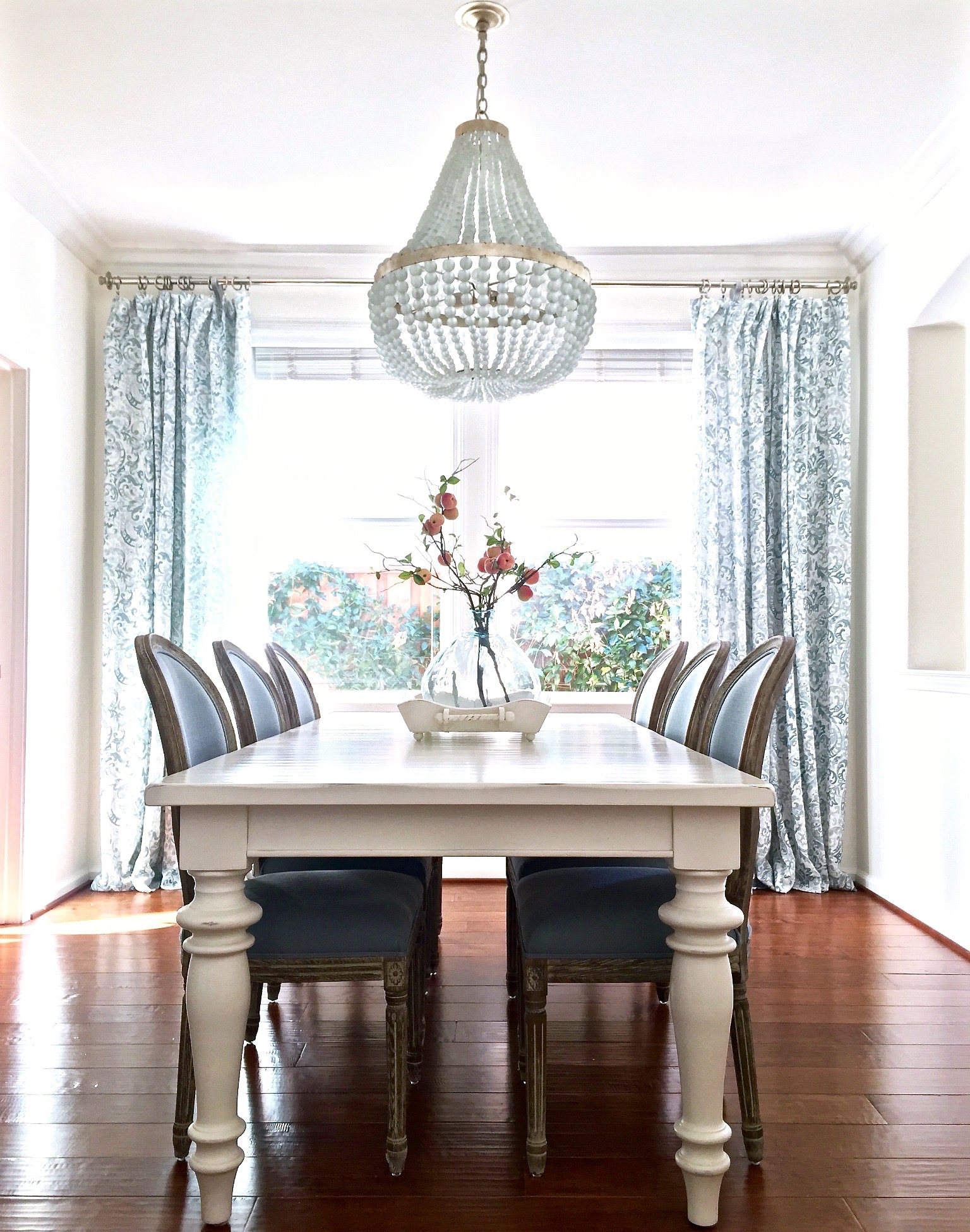 Blue and white dining room with Edisto white beaded chandelier. https://kristywicks.com