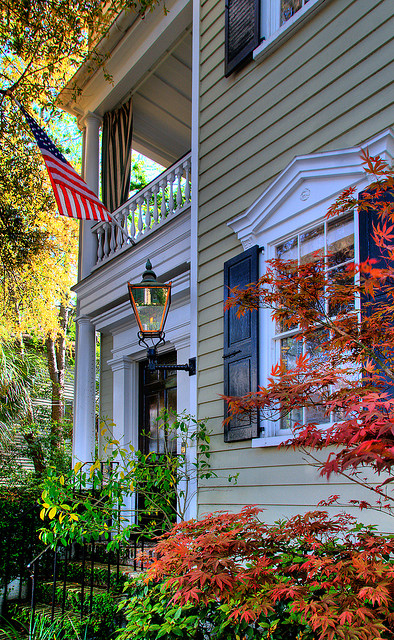 House in Autumn with flag. http://kristywicks,com