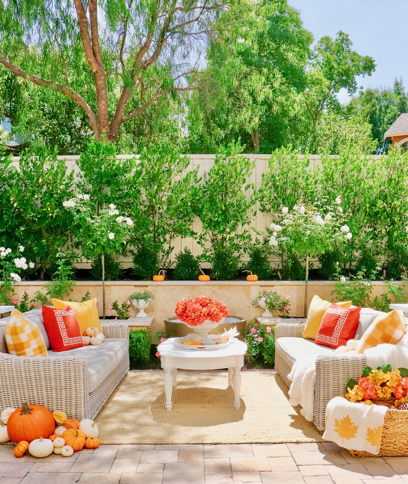 Colorful Fall Outdoor Inspiration and Decor - Pumpkins, harvest, oranges, reds, yellows and more this year. Everything a cozy outdoor space needs in autumn!